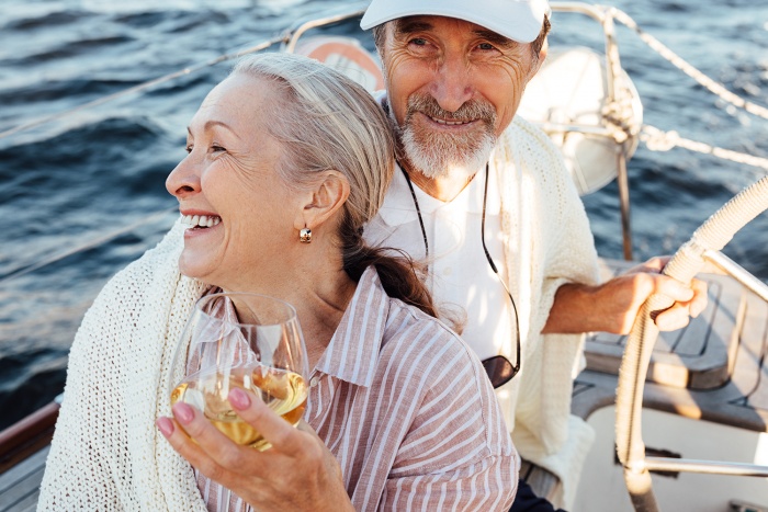 A retired couple enjoys sailing