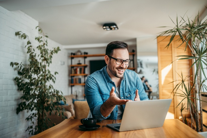 Man using a laptop for a video call