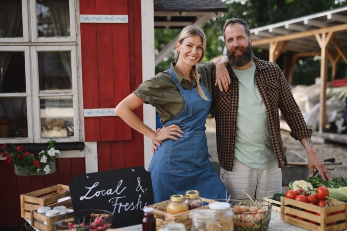 Farm stand owners work at the famers' market