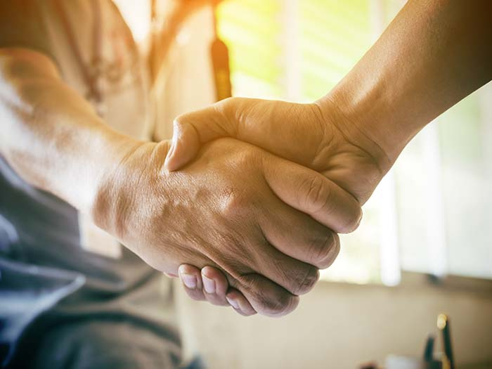 Image of People Shaking Hands