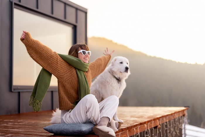 A woman and her dog enjoy their outdoor space