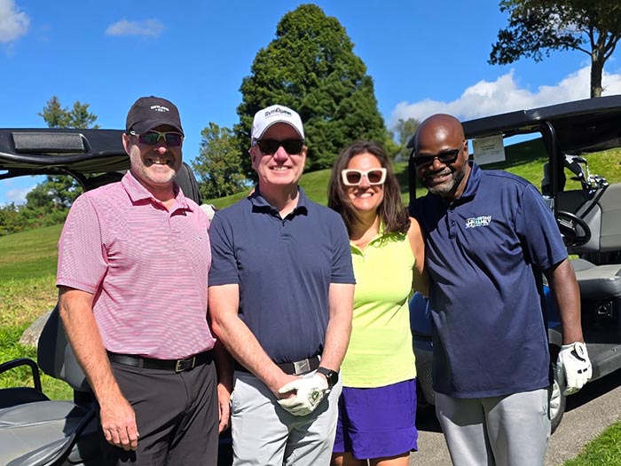 Group of golfers smiling