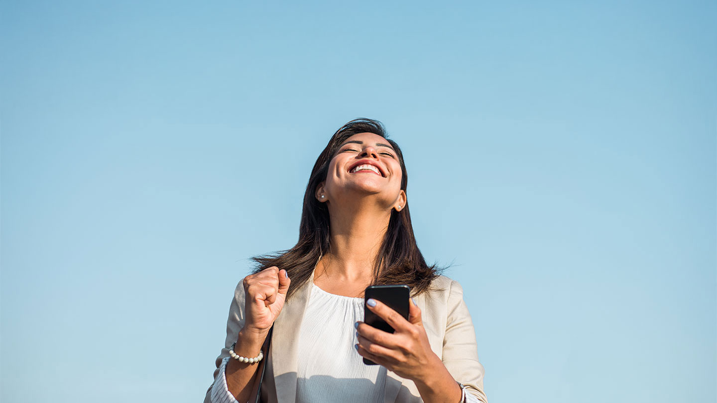 Woman happy that she paid off debt