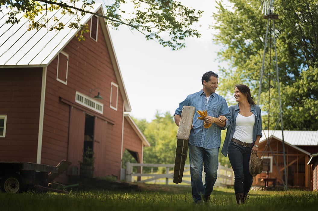 Man and Woman walking together on a farm