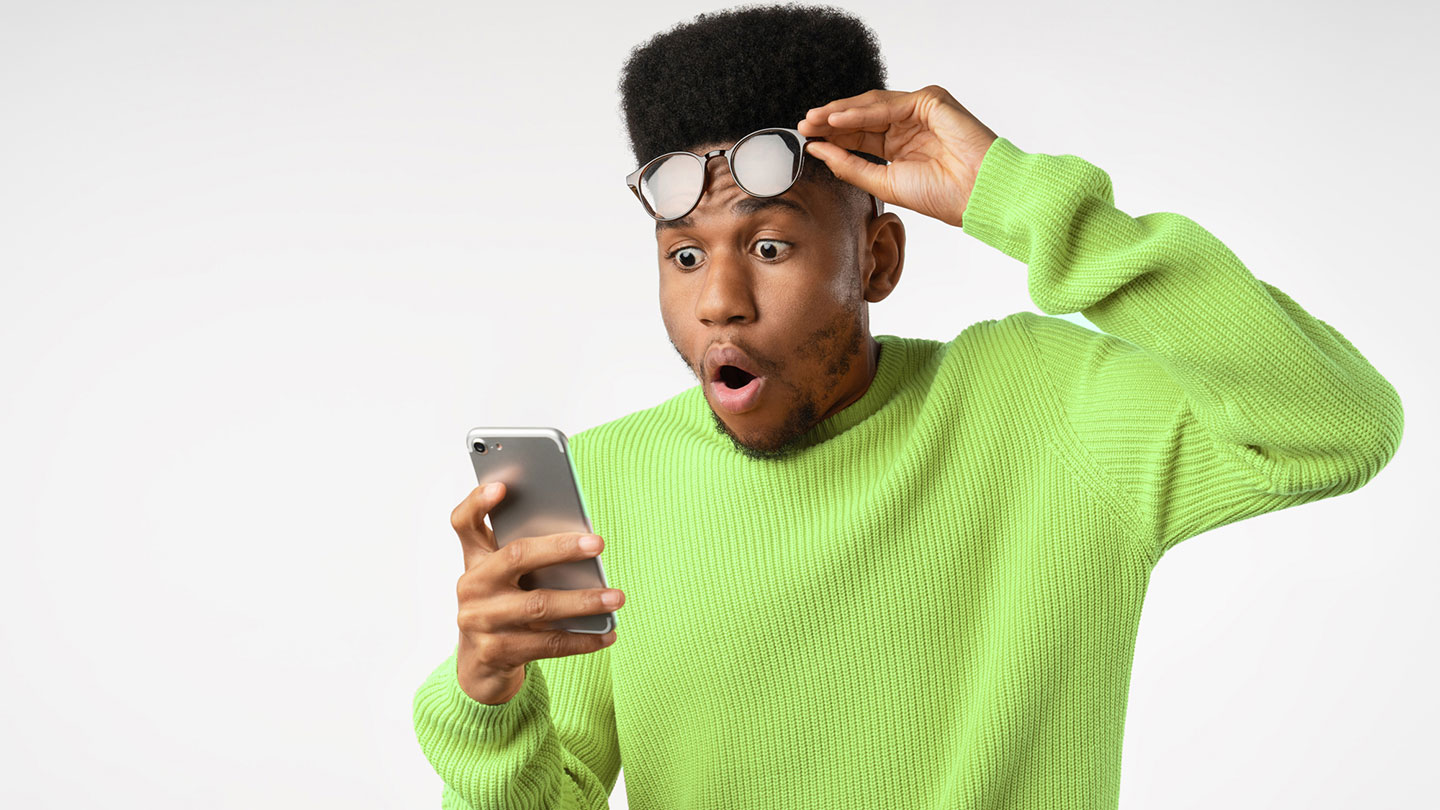 Young Man Excited About Digital Banking