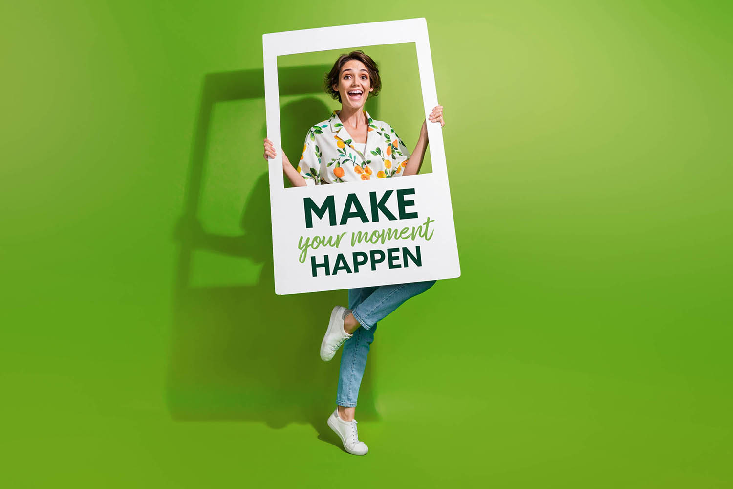 Woman holding photo frame with text